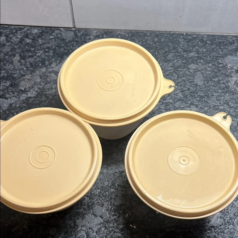 Tupperware set of 3 semi sheer  and Yellow Storage Set